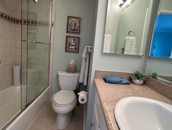1 La Playa Street Monterey, CA 93940 - Photo 13 of 17 a bathroom with a granite countertop toilet sink and shower