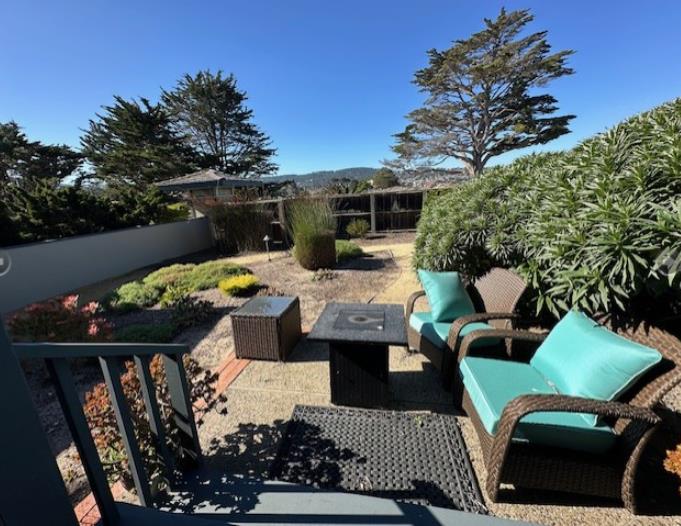 1 La Playa Street Monterey, CA 93940 - Photo 14 of 17 a view of a patio with couches table and chairs and potted plants