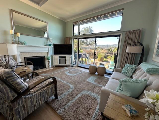 1 La Playa Street Monterey, CA 93940 - Photo 4 of 17 a living room with furniture and a fireplace