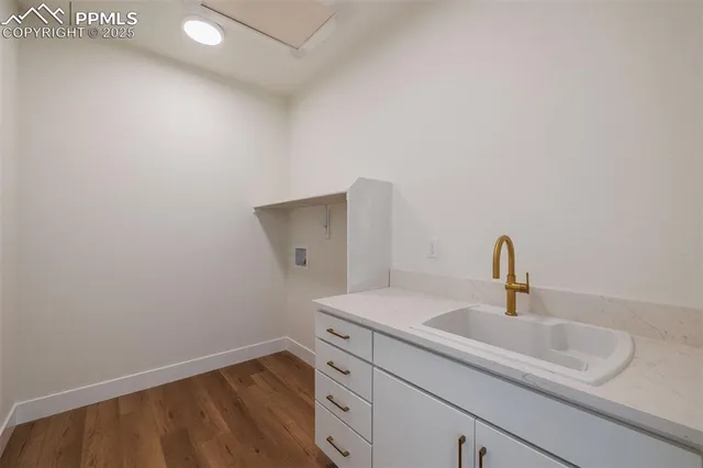 a bathroom with a sink and vanity