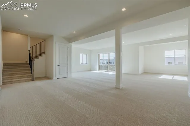 a view of empty room with front door