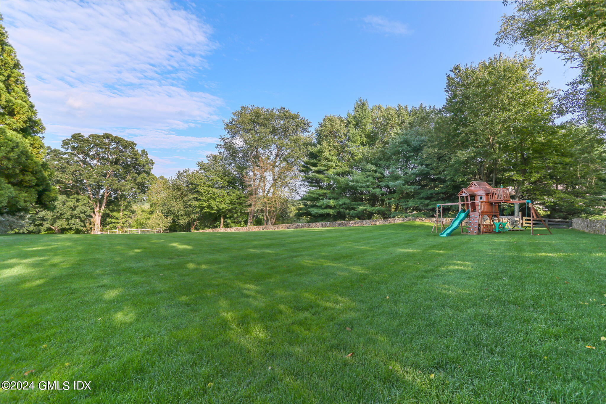 341 Rock House Road Easton, CT 06612 - Photo 41 of 56 Playground and expansive flat yard