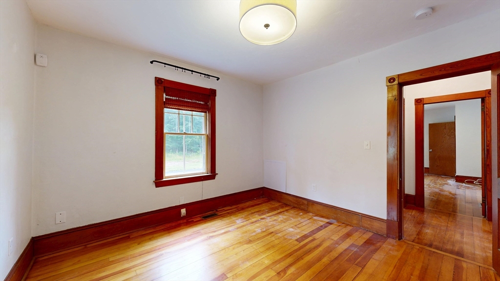 15 Slab Bridge Road Freetown, MA 02702 - Photo 15 of 39 a view of empty room with wooden floor