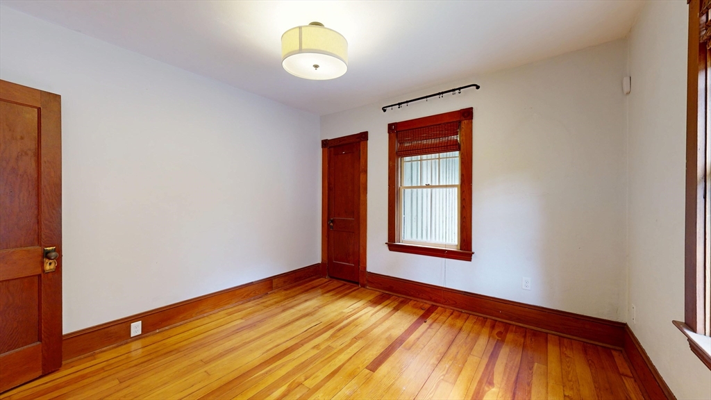 15 Slab Bridge Road Freetown, MA 02702 - Photo 17 of 39 a view of empty room with wooden floor