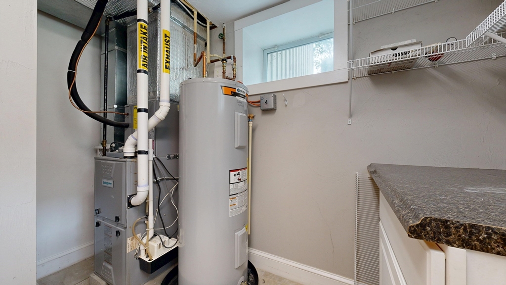 15 Slab Bridge Road Freetown, MA 02702 - Photo 27 of 39 a bathroom with a granite countertop shower a sink and a mirror