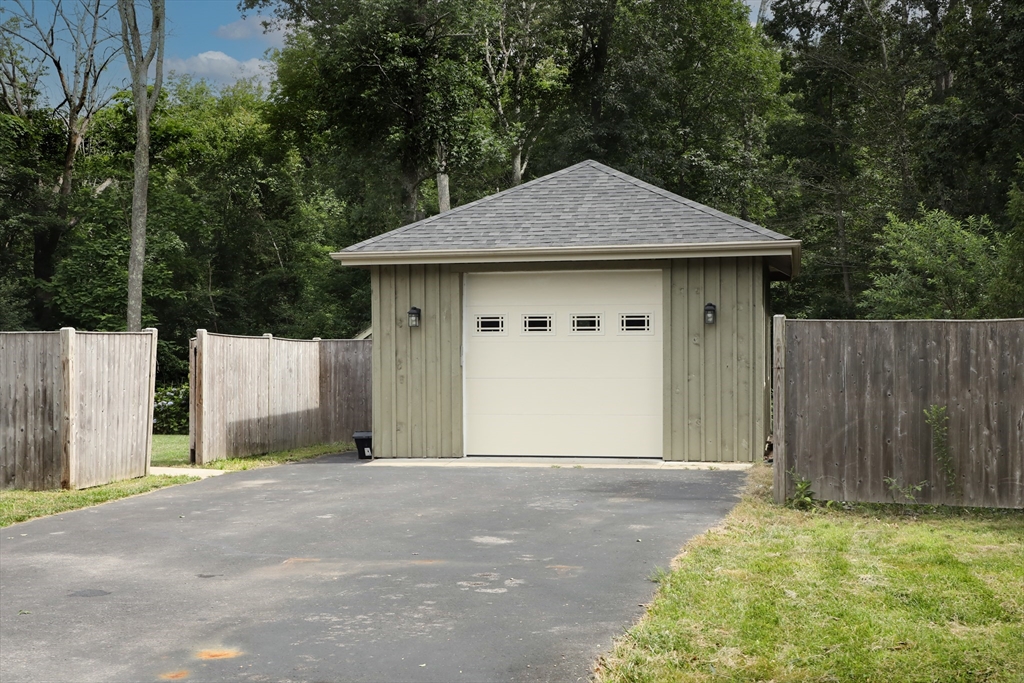 15 Slab Bridge Road Freetown, MA 02702 - Photo 28 of 39 a front view of a house with a yard