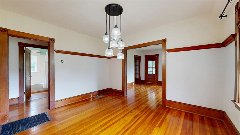 15 Slab Bridge Road Freetown, MA 02702 - Photo 6 of 39 a view of empty room with wooden floor