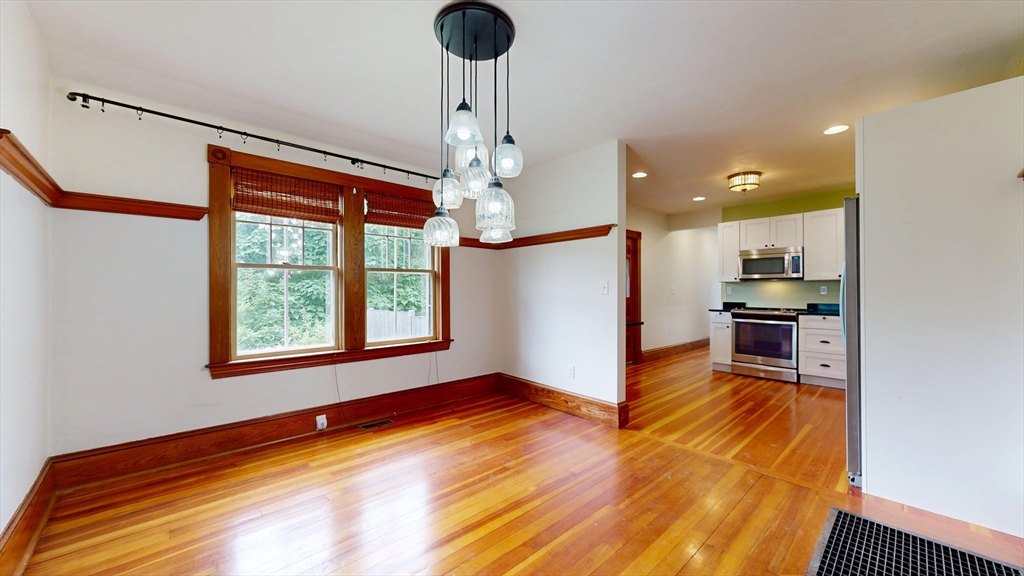 15 Slab Bridge Road Freetown, MA 02702 - Photo 7 of 39 a view of a kitchen stove and microwave