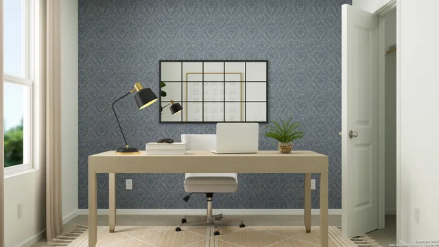 a workspace with furniture and window