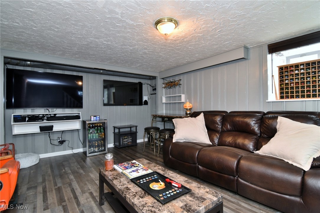 2278 Traymore Road Cleveland, OH 44118 - Photo 39 of 49 Living room featuring dark wood finished floors and wine cooler