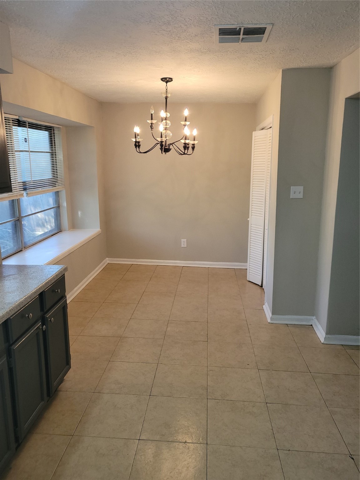 15810 Boonridge Road Houston, TX 77053 - Photo 5 of 15 a view of a kitchen with a sink and dishwasher cabinet