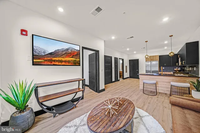 a view of a living room and dining room