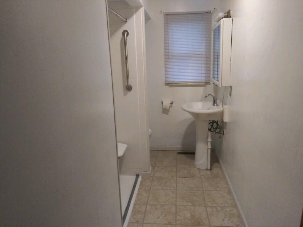 105 Evans City Road Butler, PA 16001 - Photo 8 of 25 One of 2 full baths on the main floor.