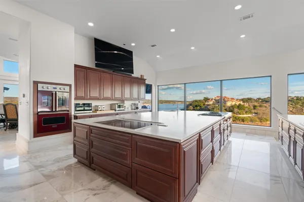 a kitchen with a sink and cabinets