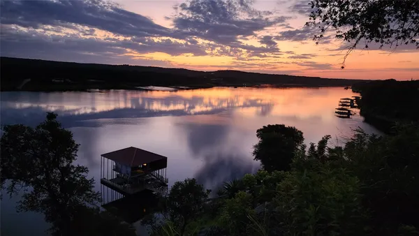 a view of lake from sunset