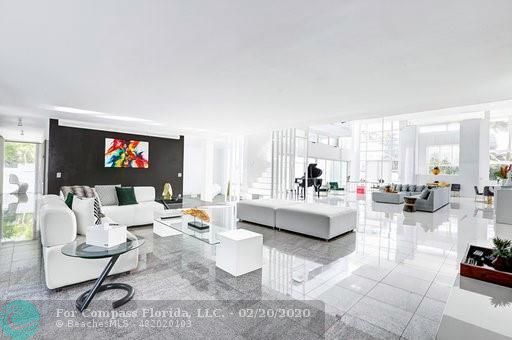 a kitchen with a table and chairs in it