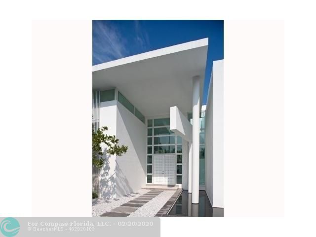 a view of a living room with a large window