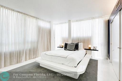 a view of living room with furniture and flat screen tv