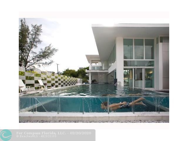 a living room with furniture and a garden