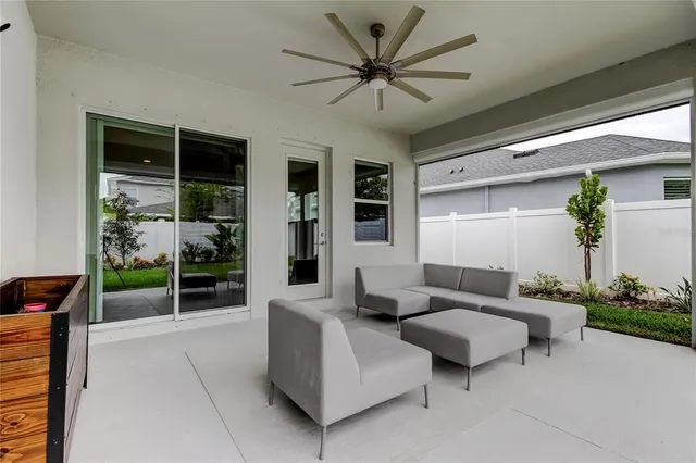 a view of a garden with a building in the background