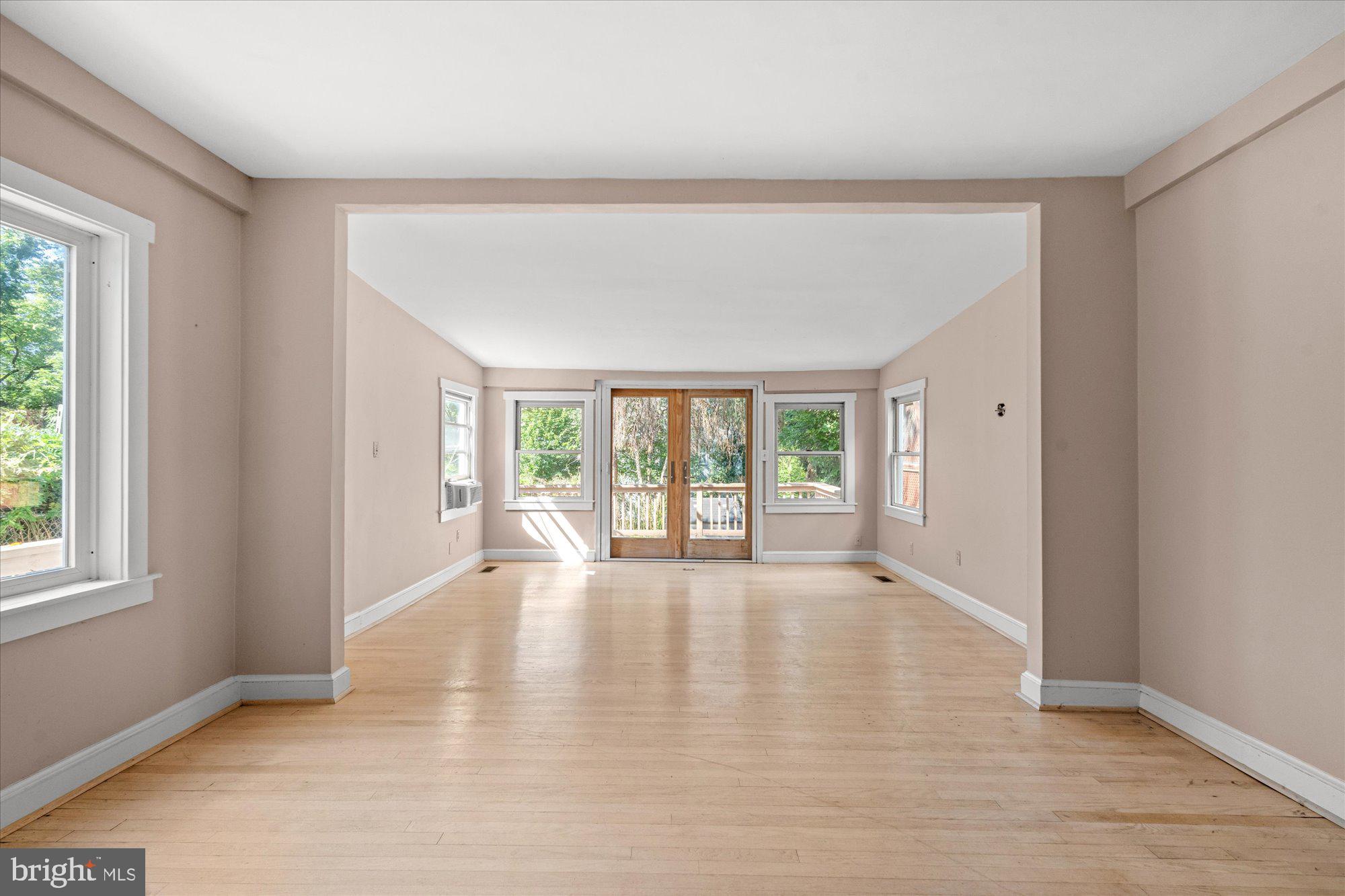 4718 Reservoir Road Northwest Washington, DC 20007 - Photo 4 of 19 Access to back deck off of family room