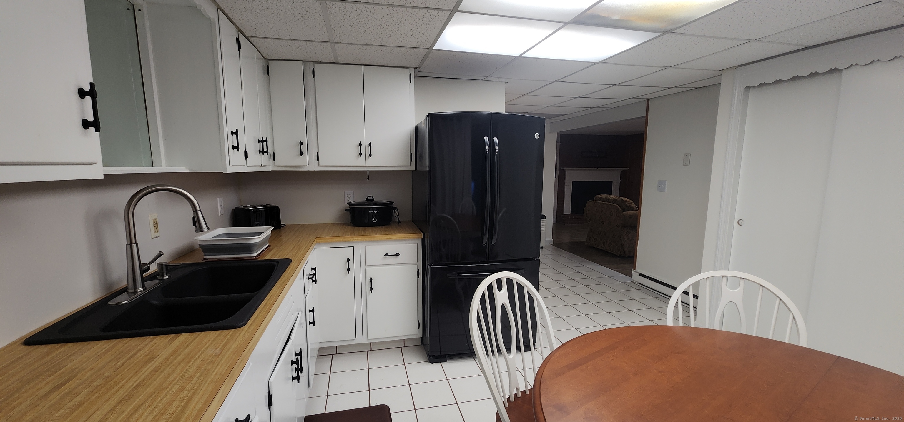 96 Stanavage Road Colchester, CT 06415 - Photo 5 of 9 a kitchen with a refrigerator and a sink