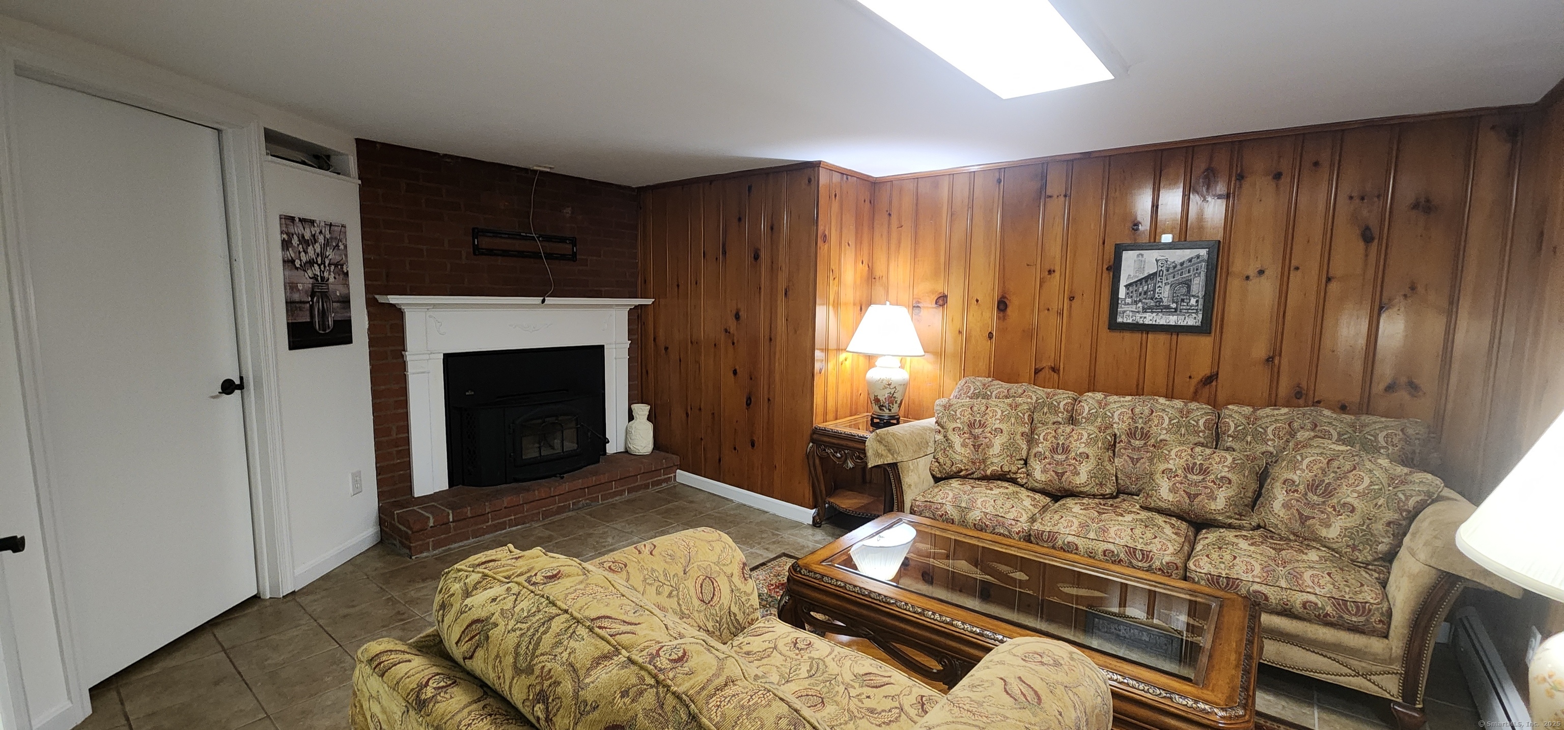 96 Stanavage Road Colchester, CT 06415 - Photo 7 of 9 a living room with furniture and a fireplace