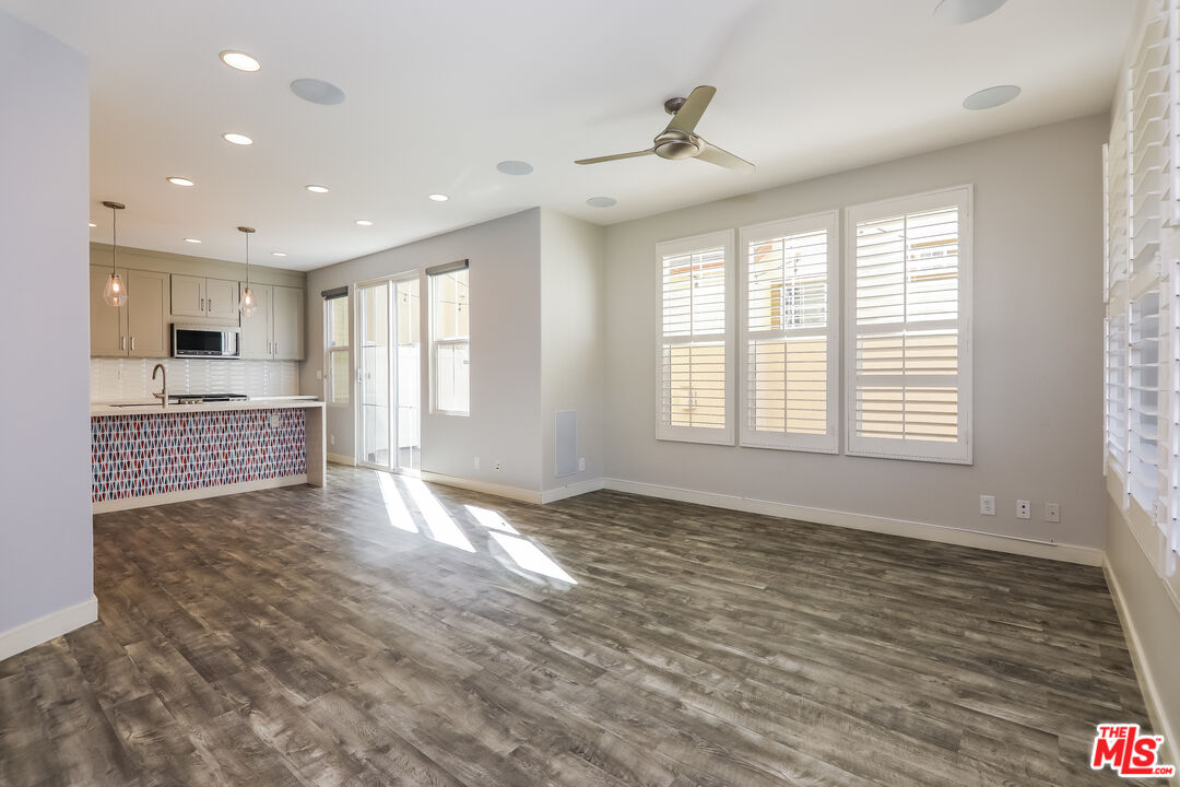 3 Wood Barn Road Ladera Ranch, CA 92694 - Photo 11 of 27 a view of an empty room with a window and wooden floor