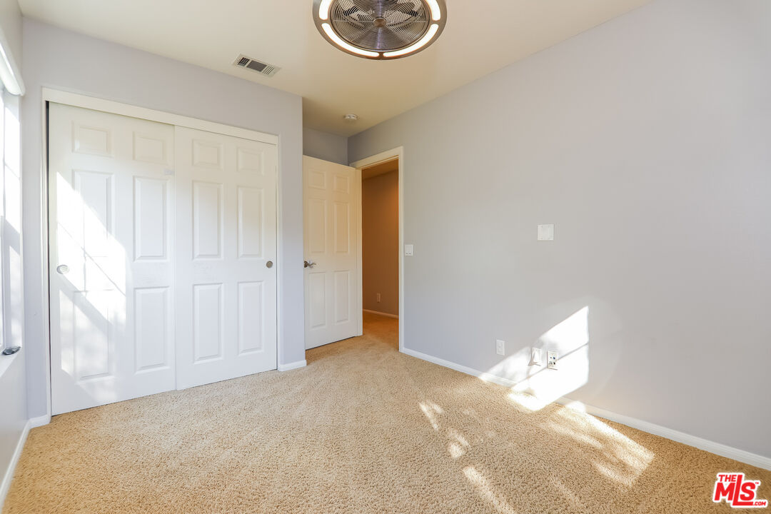3 Wood Barn Road Ladera Ranch, CA 92694 - Photo 20 of 27 a view of a room with wooden floor and window