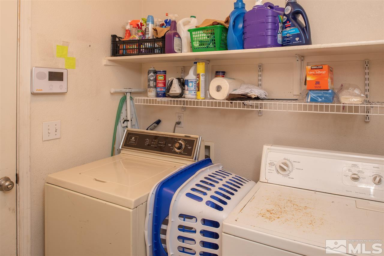 18205 Fontana Court Reno, NV 89508 - Photo 23 of 27 a utility room with dryer and washer