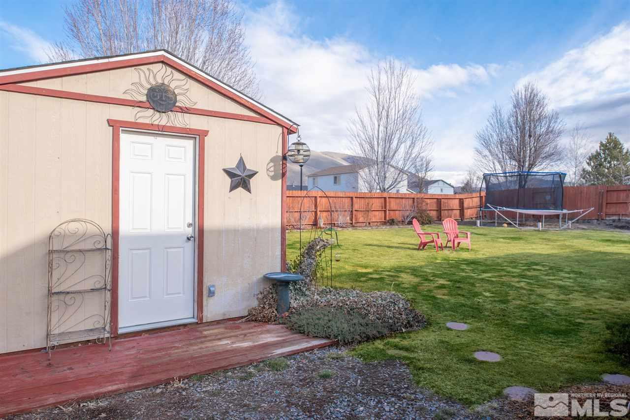 18205 Fontana Court Reno, NV 89508 - Photo 26 of 27 a view of backyard of house and garden