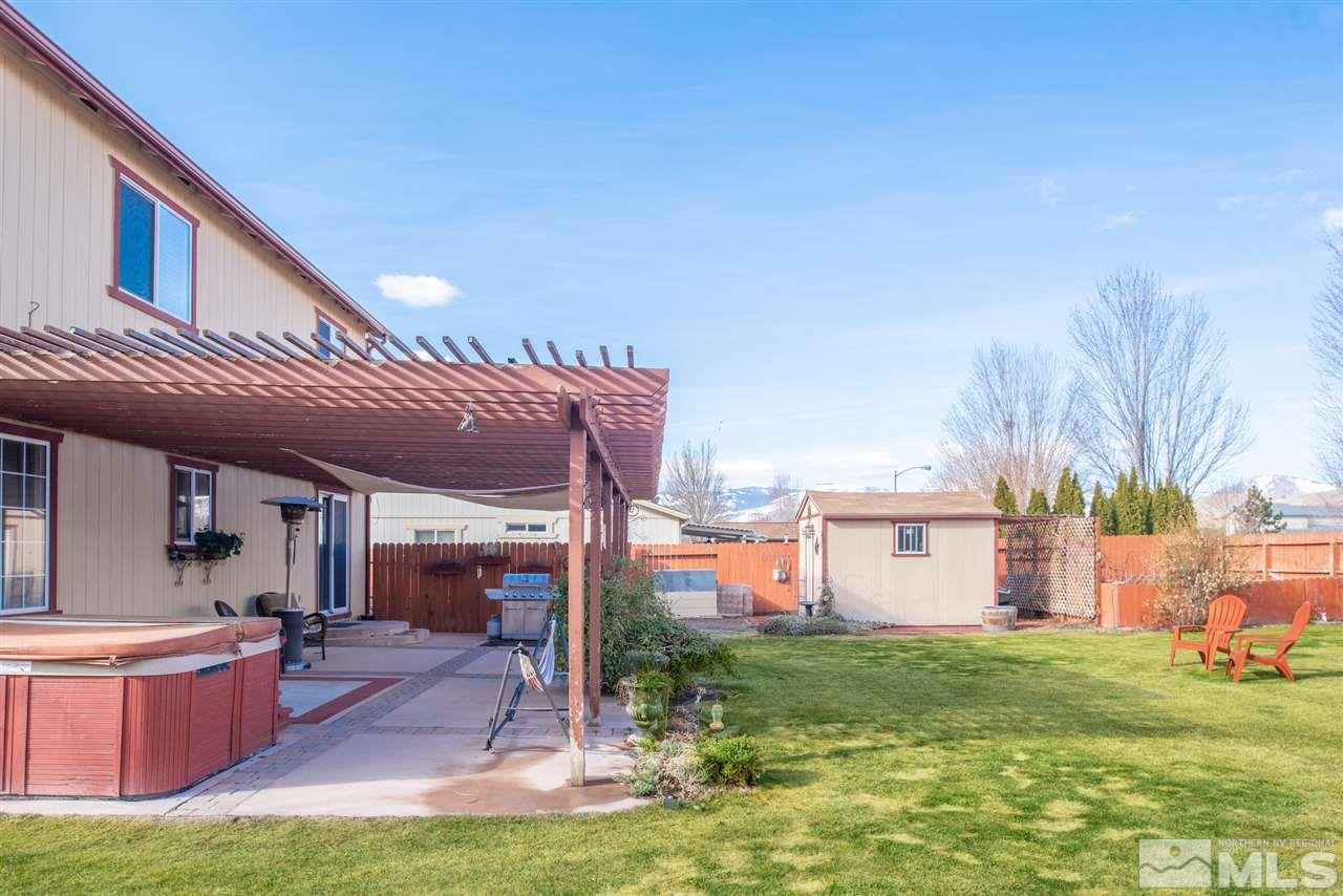 18205 Fontana Court Reno, NV 89508 - Photo 27 of 27 a view of a house with a yard porch and sitting area
