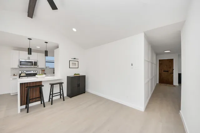 a view of work space with windows