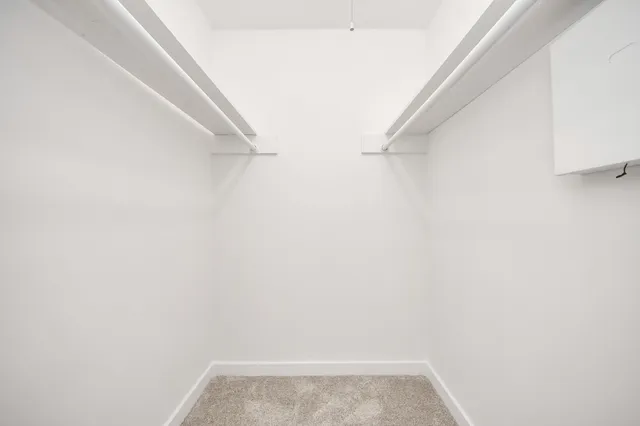 a view of small space with racks on the wall