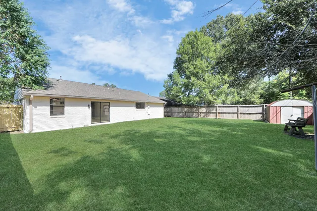 a view of a backyard with a garden