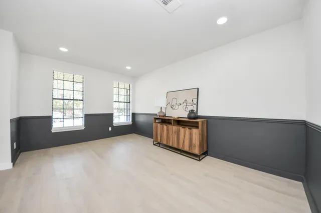 a view of workspace with furniture and window