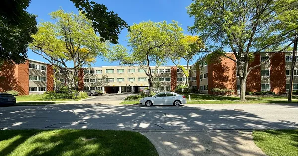 a view of street with houses and trees