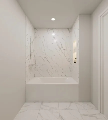 a view of bathroom and bathtub