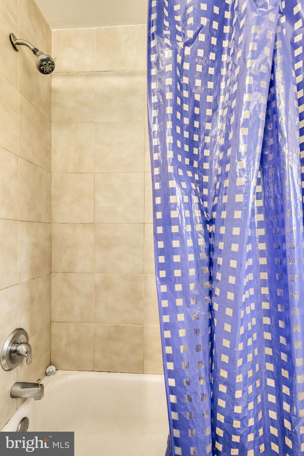 14001 Livingston Road Clinton, MD 20735 - Photo 14 of 28 a bathroom with a shower