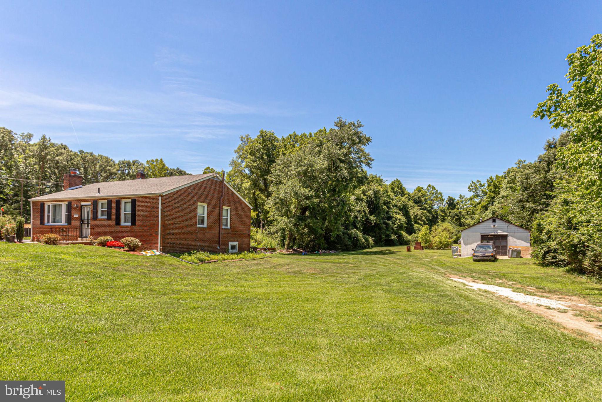 14001 Livingston Road Clinton, MD 20735 - Photo 3 of 28 a view of a house with a big yard