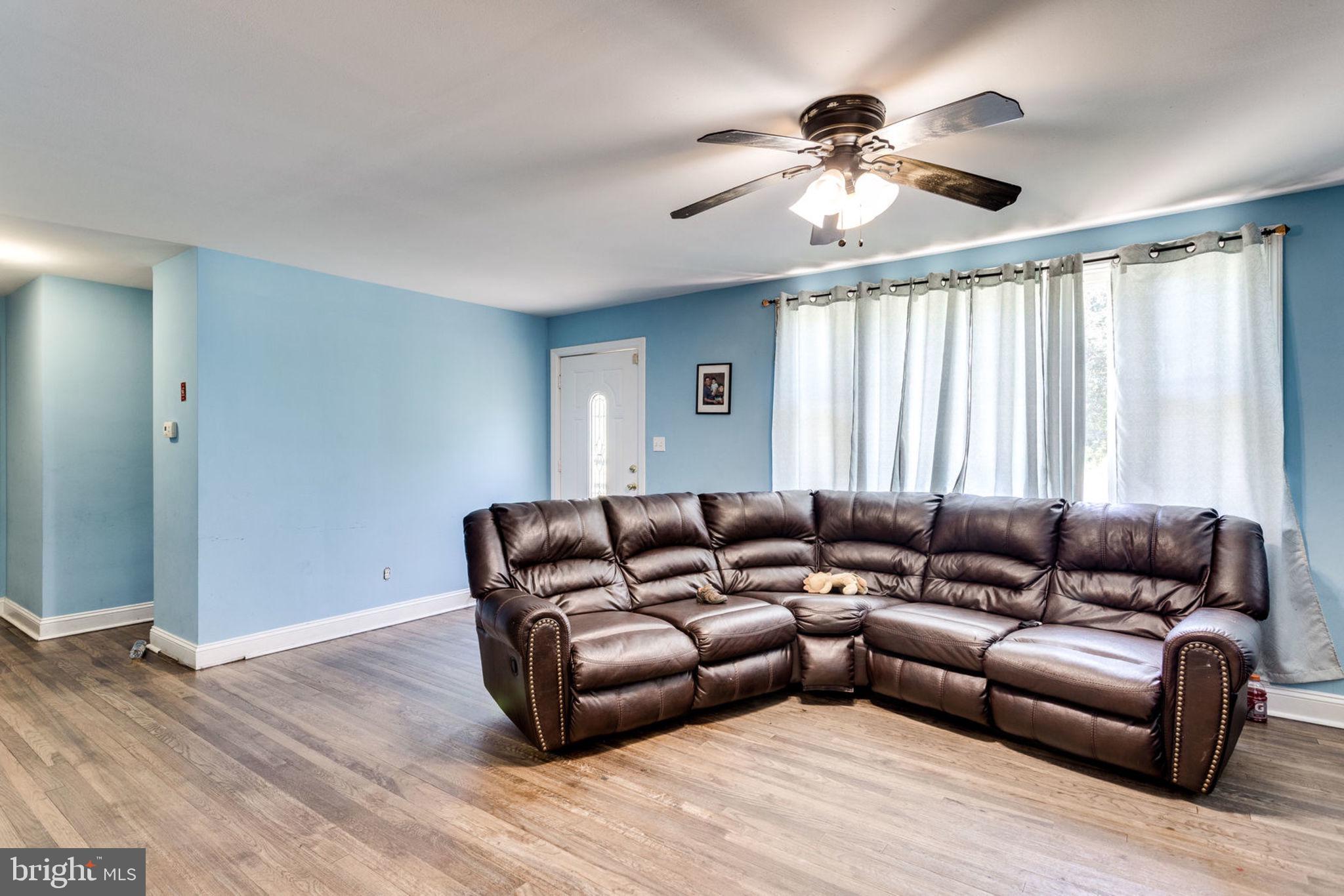 14001 Livingston Road Clinton, MD 20735 - Photo 8 of 28 a living room with furniture and a large window
