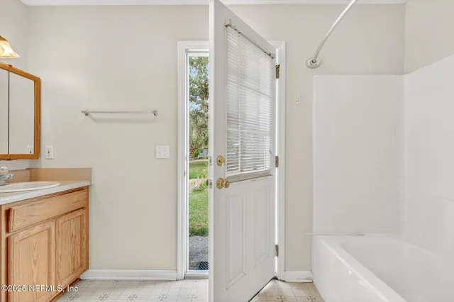 a view of an empty room and window