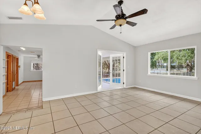 a view of a livingroom with an empty space and window