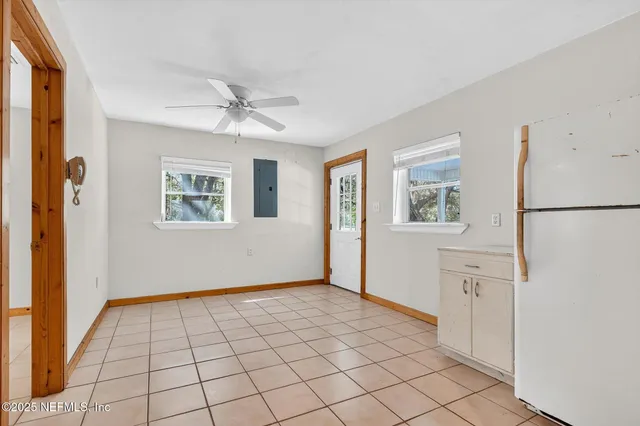 a view of an empty room and window