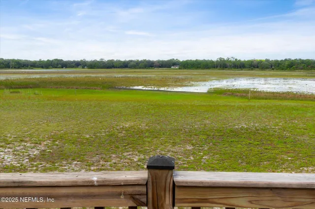 a view of a park with a lake view