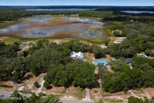 an aerial view of a house with a garden