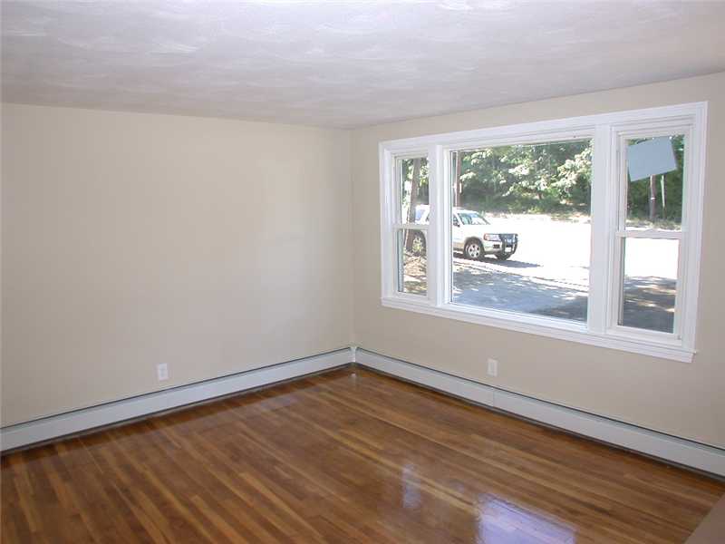 414 Arnold Road Coventry, RI 02816 - Photo 3 of 23 Living Room. Living room. Hardwoods refinished. Large picture window.