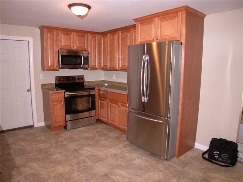 414 Arnold Road Coventry, RI 02816 - Photo 5 of 23 Kitchen. All new kitchen with top of the line cabinets, granite counters and Samsung stainless steel appliances.
