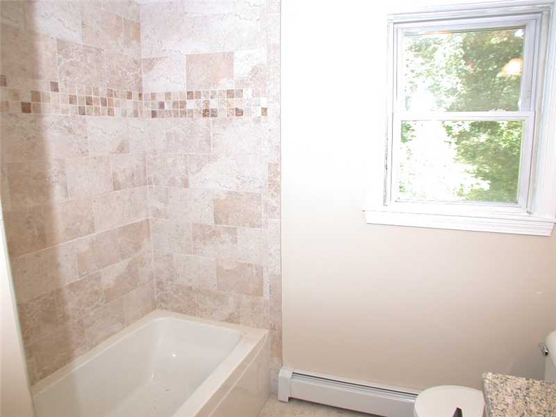 414 Arnold Road Coventry, RI 02816 - Photo 10 of 23 Bathroom. Tiled bath all new.