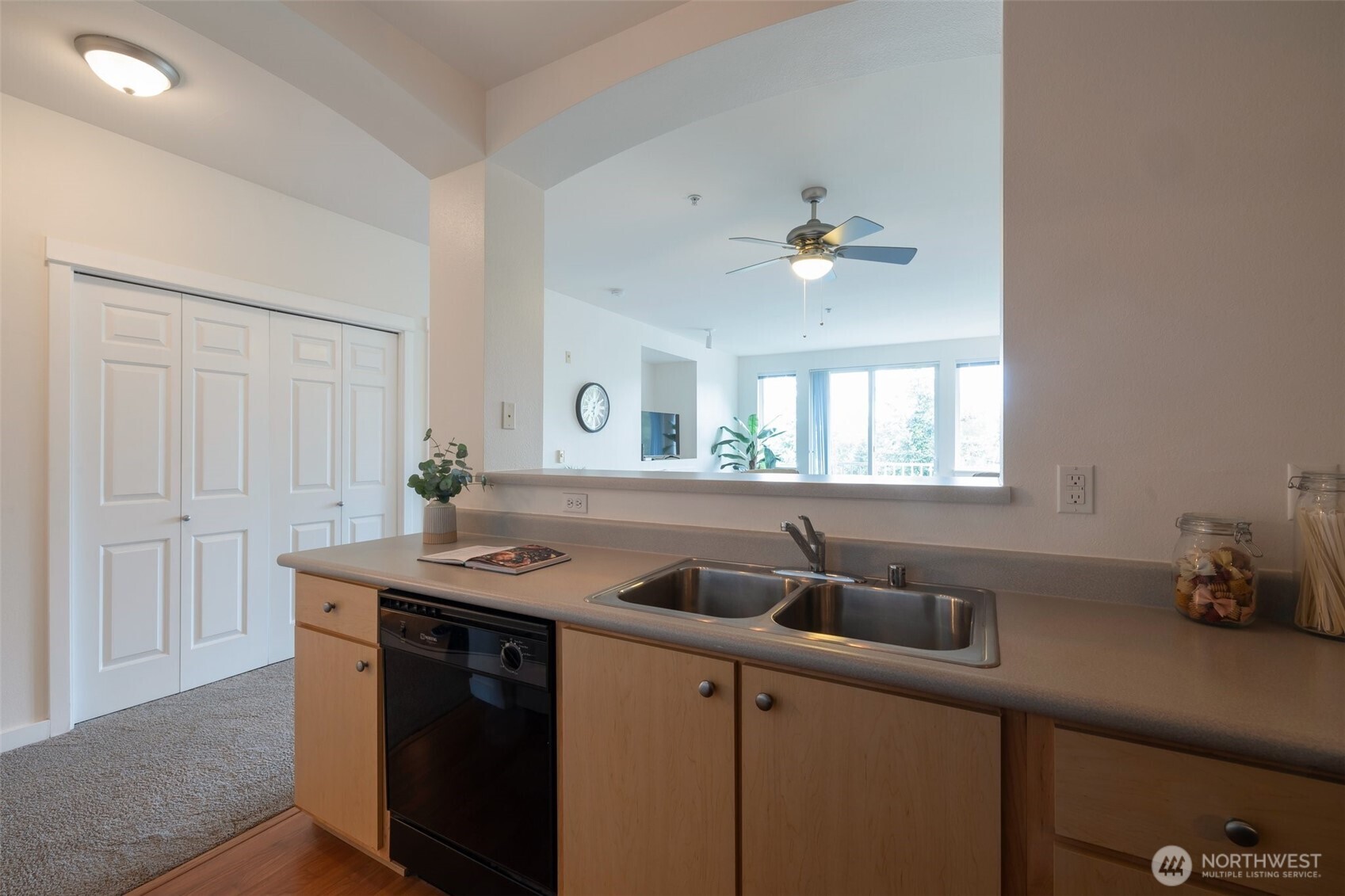 13301 Southeast 79th Place, Unit B402 Newcastle, WA 98059 - Photo 16 of 25 a kitchen with a sink and a window